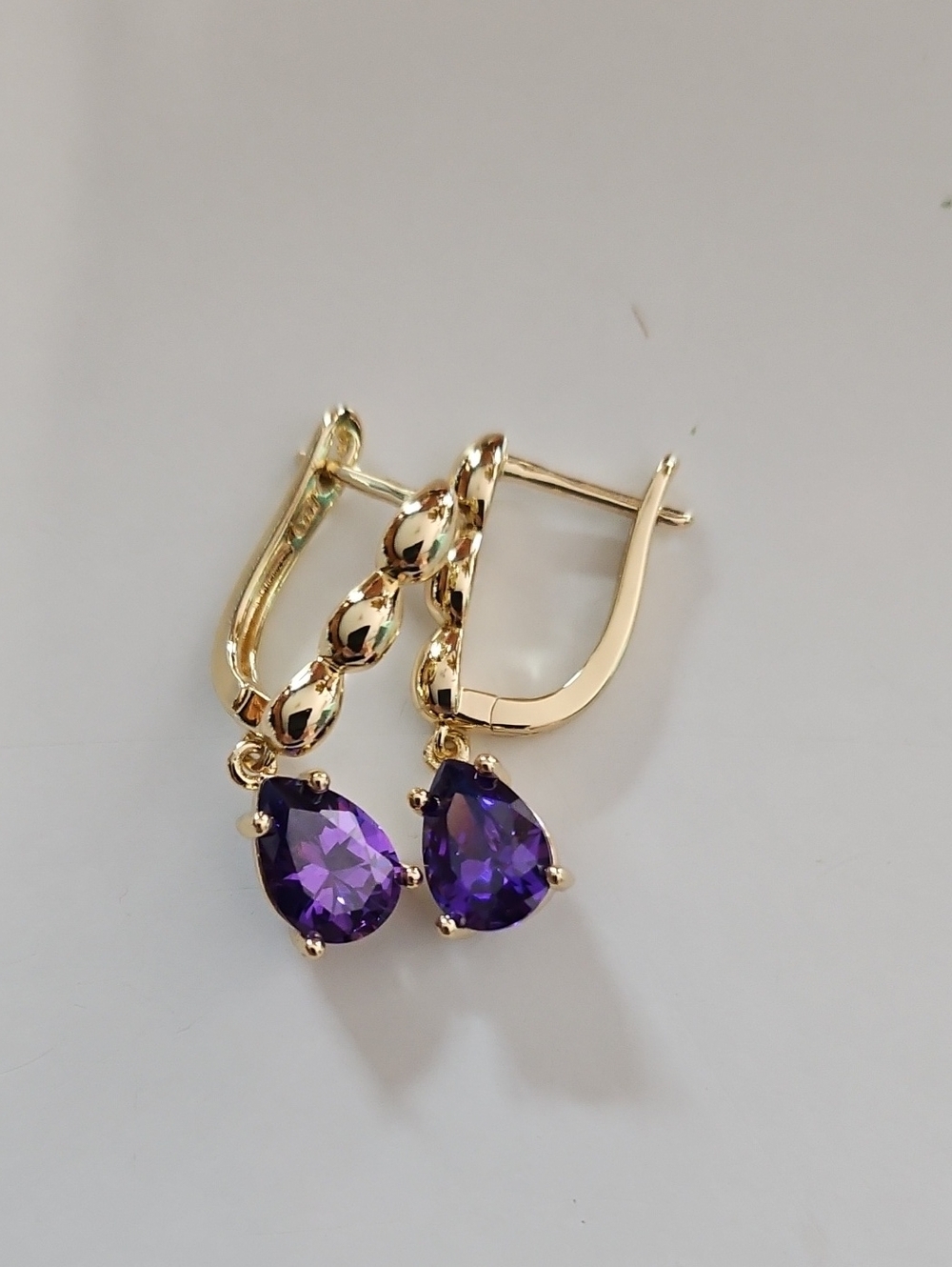Pretty Bird Gold Drop Earrings with Purple Teardrop Gems